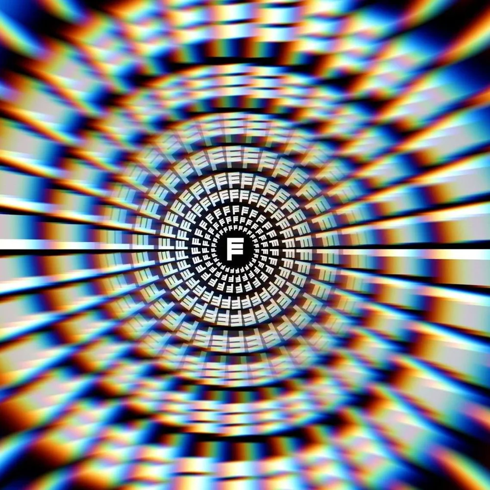 Fraktality's archival visual identity: a letter F within a colourful optical tunnel